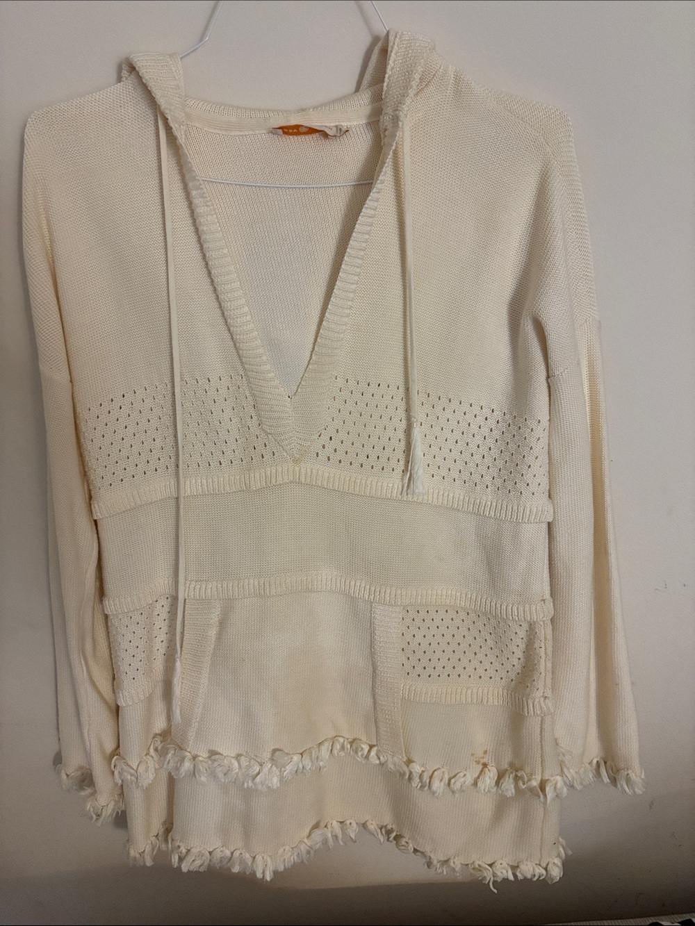 Tory Burch Cream V‑Neck Knit Hoodie with Fringe Hem and kangaroo pockets